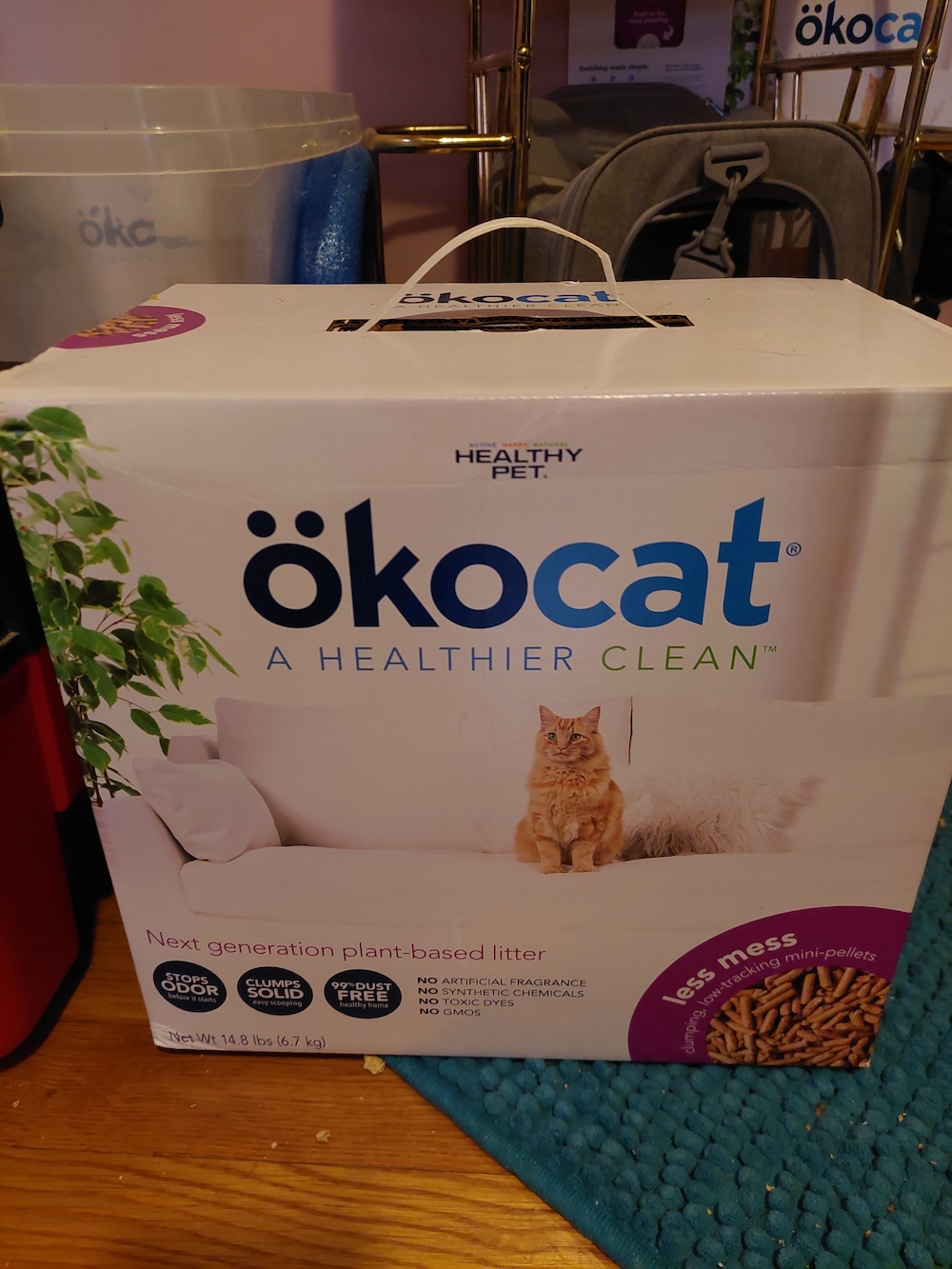 Box of Okocat wood pellet cat litter.